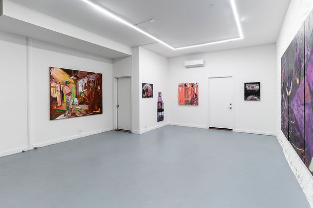Bright white gallery room with several colorful paintings and photographs displayed on the walls, clean and minimal mood